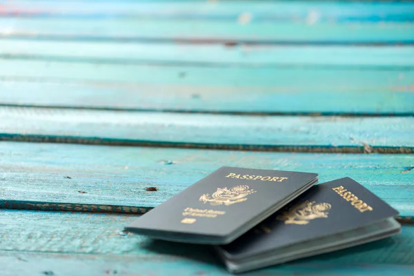 American passports on a distressed blue background