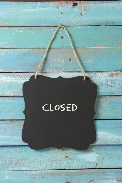 Closed sign on blue background — Stock Photo, Image