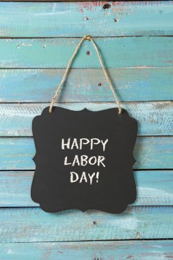 İşçi Bayramı tebeşir işareti üzerinde ahşap arka plan