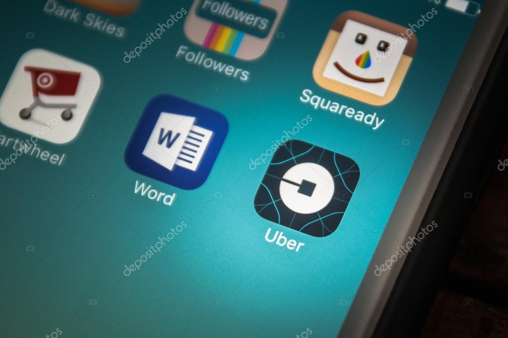 LAS VEGAS, NV - August 26,2016: Vignette Selective Focus Apple iPhone 6+ with Uber application showing on screen. Uber is a social ride sharing app for smartphones.