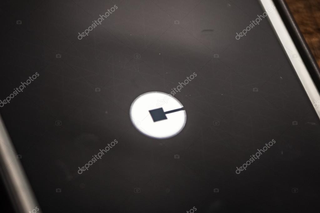 LAS VEGAS, NV - August 26,2016: Vignette Selective Focus Apple iPhone 6+ close up with Uber application showing on screen. Uber is a social ride sharing app for smartphones.