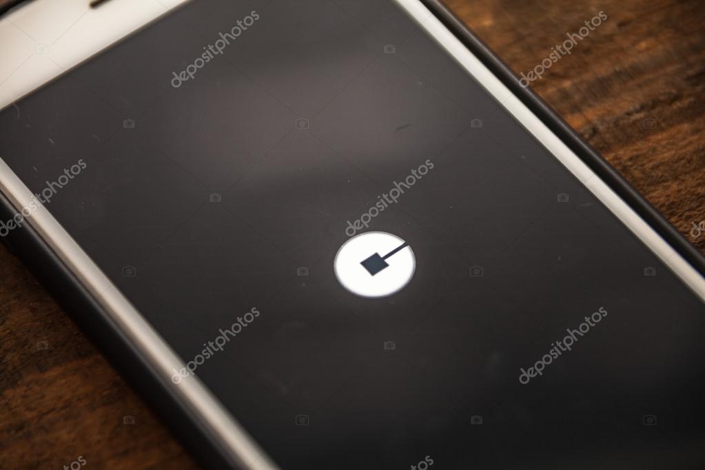 LAS VEGAS, NV - August 26,2016: Vignette Selective Focus Apple iPhone 6+ with Uber application showing on screen. Uber is a social ride sharing app for smartphones.