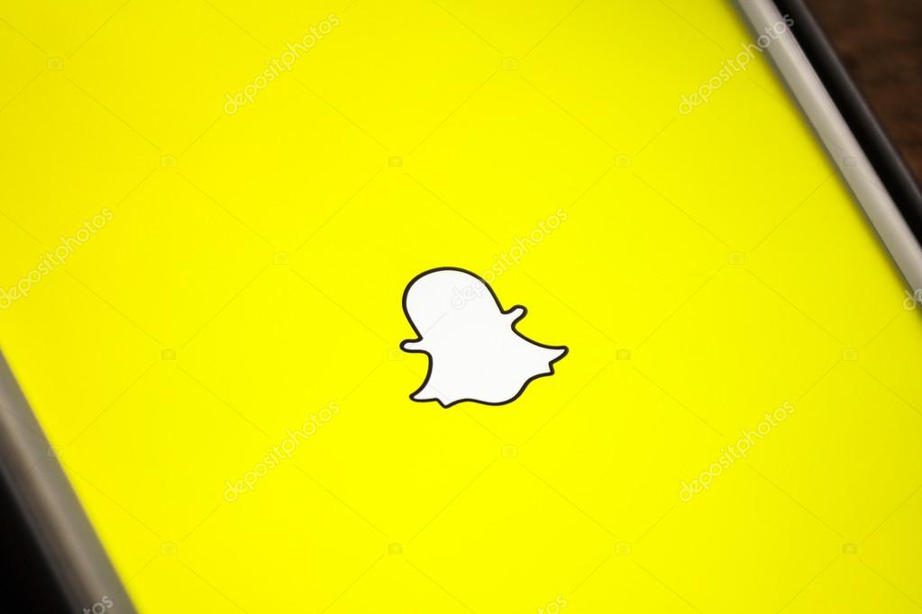 LAS VEGAS, NV - August 26,2016: Vignette Selective Focus Apple iPhone 6+ close up with Snapchat application showing on screen. Snapchat is a social media app for smartphones.