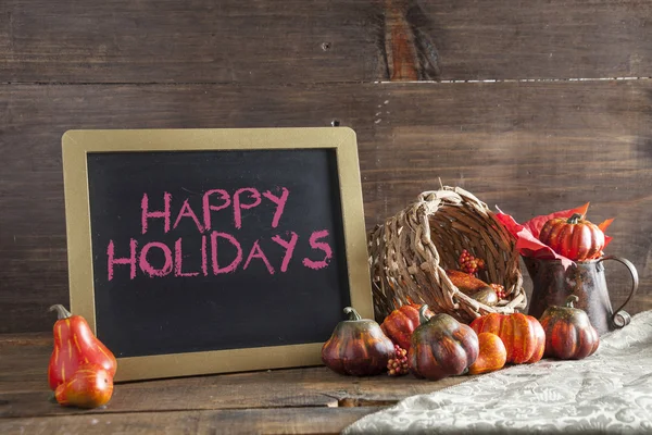 Happy Holidays Written In Red Chalk On Black Chalkboard Backgrou — Stock Photo, Image