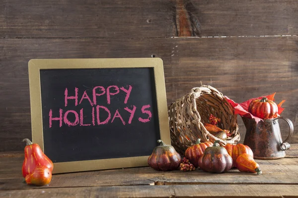 Happy Holidays Written In Red Chalk On Black Chalkboard Backgrou — Stock Photo, Image