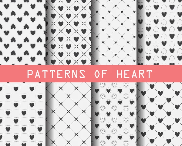 Black and white hearts seamless patterns — Stock Vector