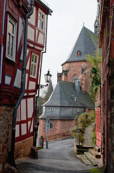 View through a gap between half timbered houses in old town