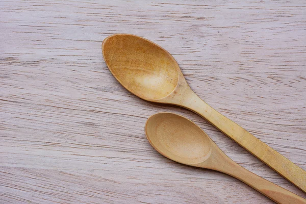 Wooden and spoon on wooden top view — Stock Photo, Image