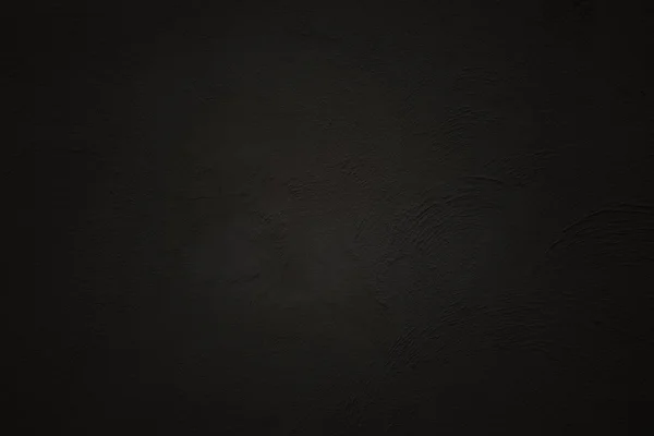 Grijze getextureerde muur, donkere randen Stockfoto