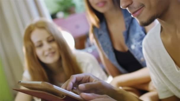 Group of three hipster fun using a tablet computer — Stock Video