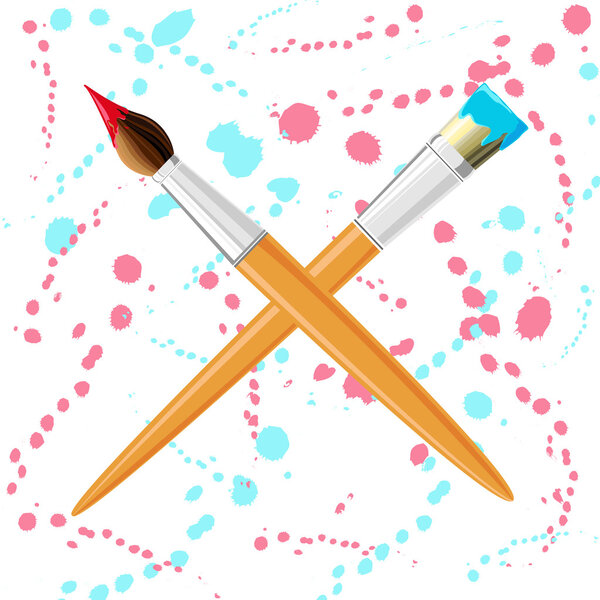 Two brushes on a background of paint splashes