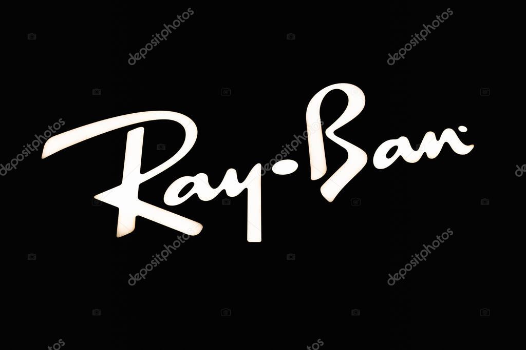 Monochrome Ray Ban logo in white on a black background. London, UK, 4 July 2023