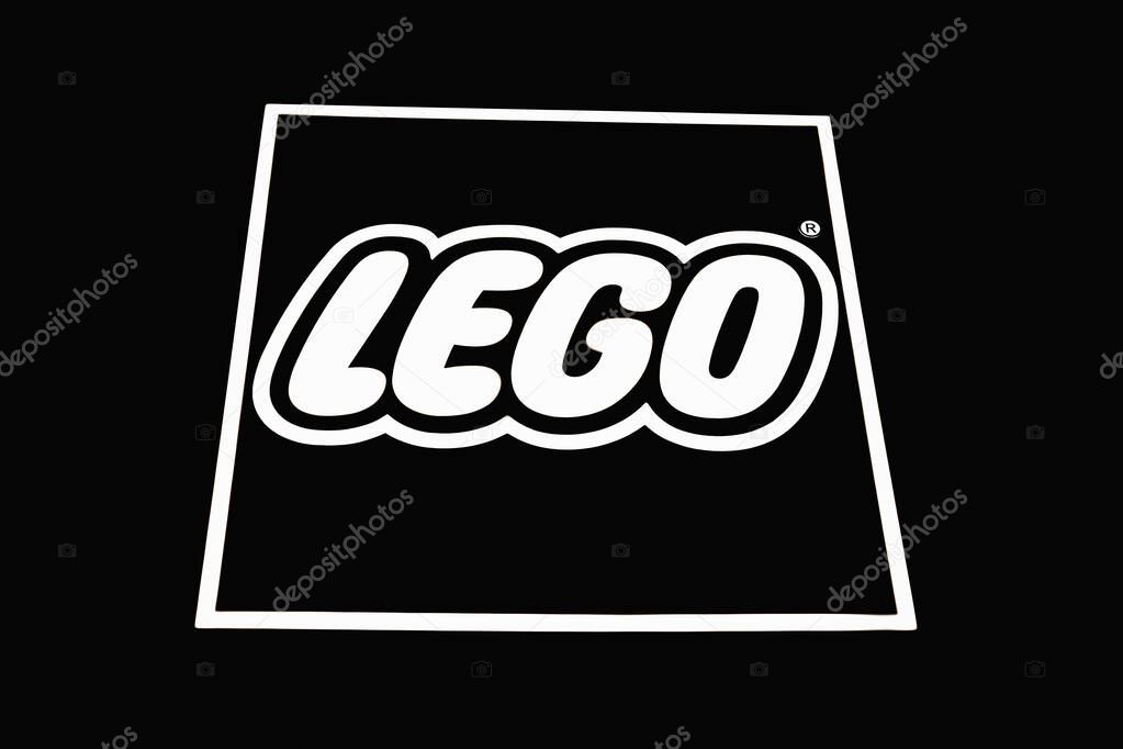 Monochrome LEGO brand emblem against dark backdrop. London, UK, 4 July 2023