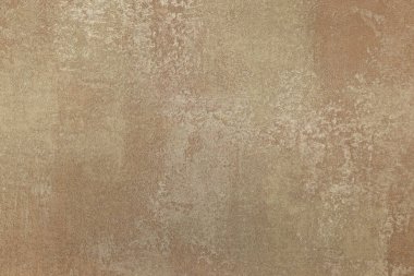 İnce bir endüstriyel alçı etkisi ve klasik estetiğe sahip kahverengi yüzeyli..