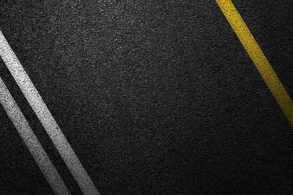 Düzey Asfaltlı yol bölen bir beyaz ve sarı çizgili. Asfalt, en iyi görünüm doku.