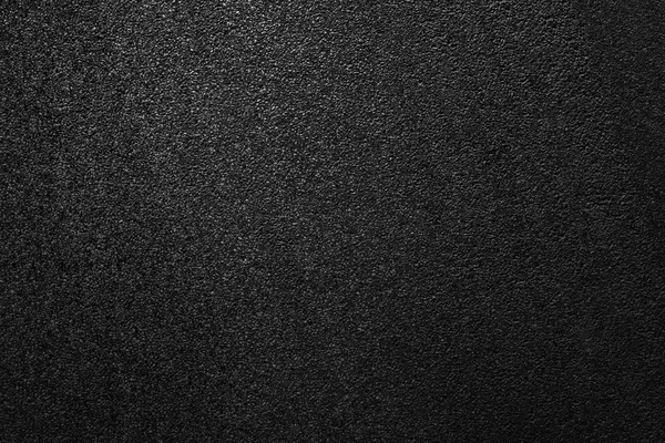 Pürüzsüz asfalt yolu. Asfaltın dokusu, üst görünüm.