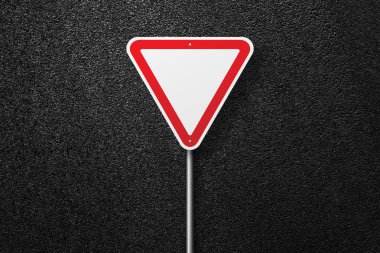 Yol iz arka plan asfalt üzerinde üçgen şekli. Yol verin. Asfalt, en iyi görünüm doku.