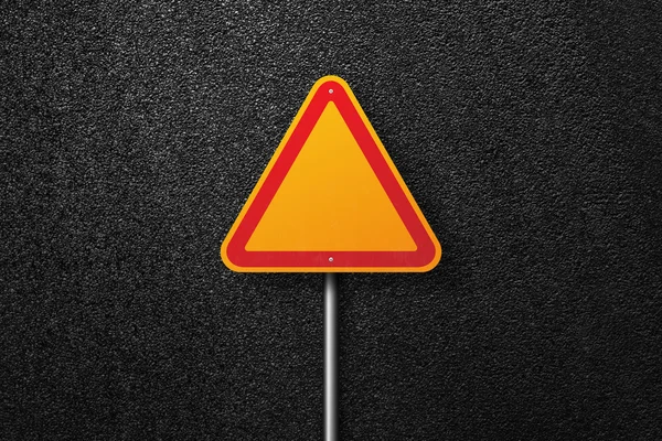 Road signs of the triangular shape on a background of asphalt. The texture of the tarmac, top view. — Stock Photo, Image