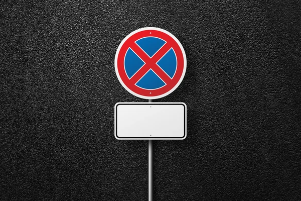 Prohibitory blank road sign on a background of asphalt. No parking. The texture of the tarmac, top view.