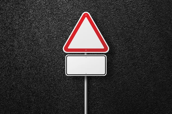 Blank road signs of the triangular shape on a background of asphalt. The texture of the tarmac, top view. — Stock Photo, Image