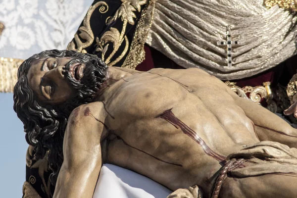 Holy Week in Seville Jesus died in the arms of his mother, brotherhood of Baratillo — стокове фото