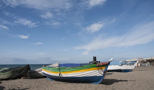 Fishing boats on the shore of a beach on the Mediterranean Sea