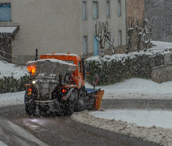 Snow clearing in the mountain road