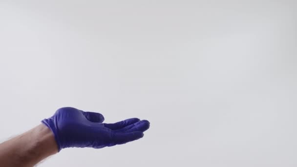 Hand Medical Gloves Holding Something White Background Place Insert Hand — Stock Video