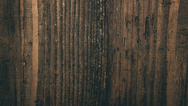 Wooden background with knots, texture of walnut wood. Abstract wood background.