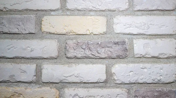 White brick wall, brick texture, background from white natural bricks
