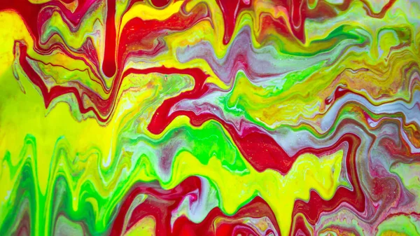 Liquid paints in colorful mixed colors. Beautiful images of acrylic paints, colorful background of bright paints. Abstract, modern marble, neon blobs