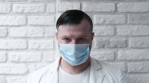 Portrait Handsome Doctor White Jacket Medical Mask His Face Background — Stock Video