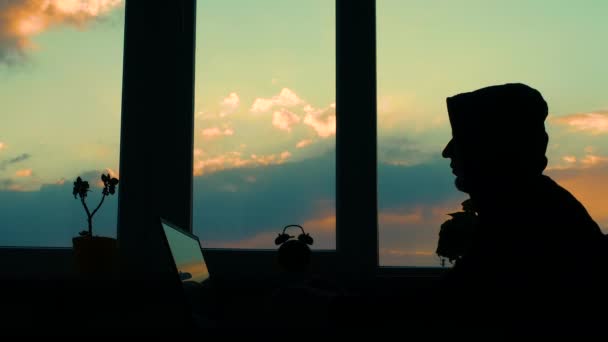 Online Education Silhouette Hacker Working Computer Man Table Window Sunset — Stock Video