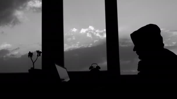 Silhouette Hacker Working Intensively Laptop Working Computer Man Table Window — Stock Video