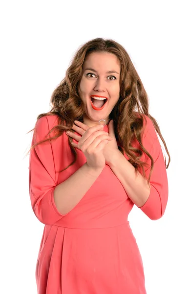 Surprised beautiful young woman holding  her engagement ring . I