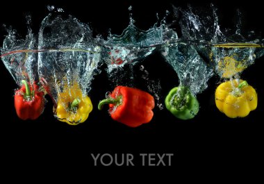 Splash water with droping bell peppers clipart