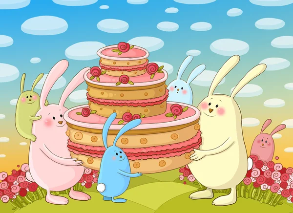 Милые кролики и торт — стоковое фото