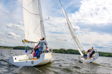 Moscow , August 30 : Team athletes participating in the sailing competition - match race , held in Moscow on Pirogov Reservoir August 30, 2015