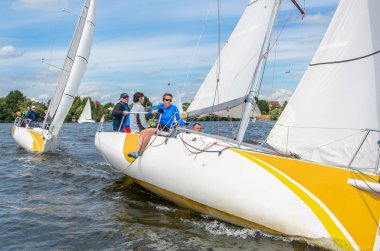 Moscow , August 30 : Team athletes participating in the sailing competition - match race , held in Moscow on Pirogov Reservoir August 30, 2015