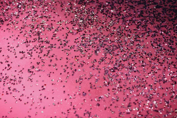 Abstract purple sparkles glitter on floor after celebration event — Stock Photo, Image