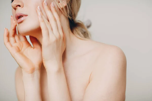 Young adult doing facial gymnastics self massage and rejuvenating exercises face building for skin and muscles lifting — Stock Photo, Image