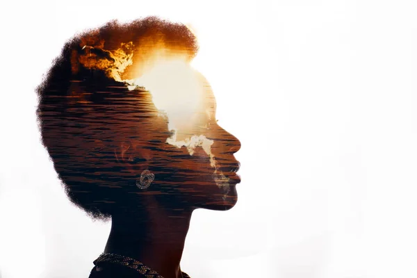 Multiple exposure image with sunrise and sea inside woman silhouette. Psychology and mindset concept — Stockfoto