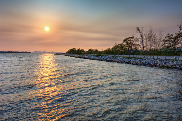 Calm water at sunset