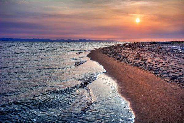 Океанський пляж на заході сонця — стокове фото