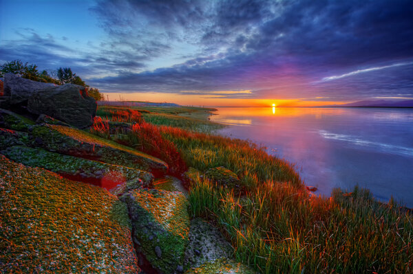 Calm water at sunset