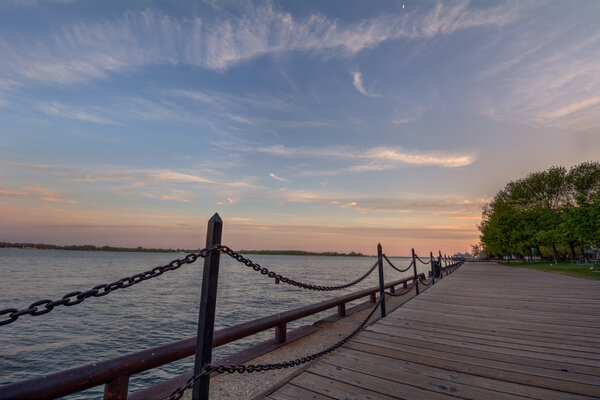 Wooden pier around the calm river