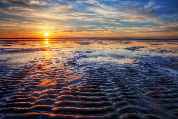 Curves on the sand during the sunset — Stock Photo, Image