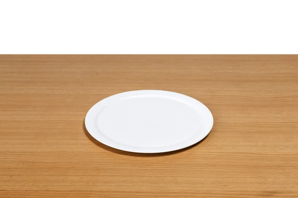 Дерев'яний стіл (стіл) з білою тарілкою ізольовані білі . — стокове фото