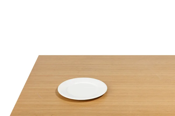 A mesa de madeira (mesa) com prato branco isolado branco . — Fotografia de Stock