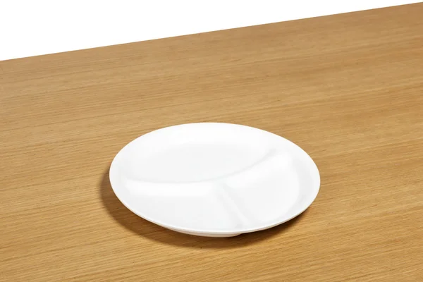 Drewno desk(table) z biały biały danie na białym tle. — Zdjęcie stockowe
